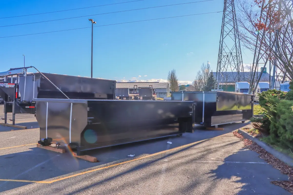 Roll-off dumpster ready for waste disposal at job site for Demolition Dumpster Rental in Salina